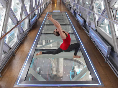 Yoga across a glass floor above the Thames image
