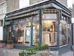 Mora & Upham Antiques image