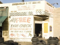 Chequered Tyre Service image