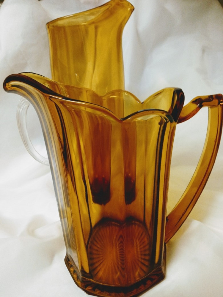 Vintage glass water pitchers. #glassware