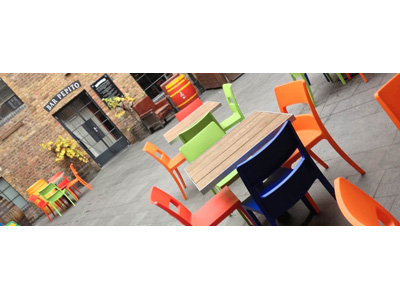 Outside furniture at Camino.  Find 