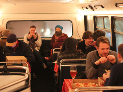 Eat Pizza on a Double Decker  image