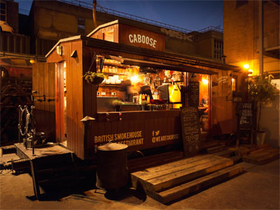 Dance and eat food served out of an old train carriage image