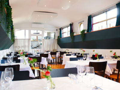 Eat at this upmarket restaurant on the water image