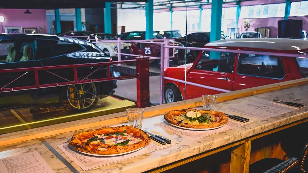Order pizza in a car showroom picture