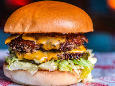 Eat burgers at the new supersized MeatLiquor image