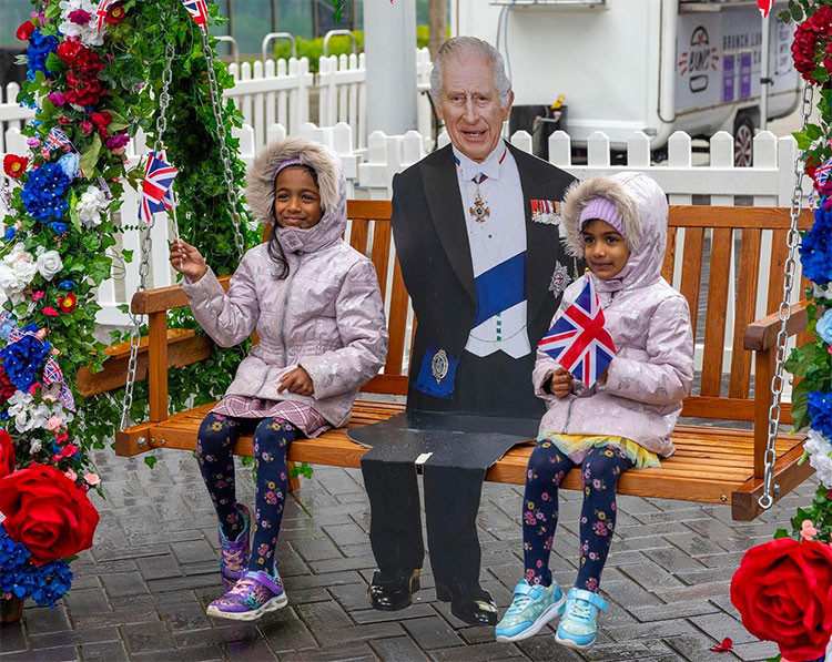 Wembley Park provides iconic backdrop as hundreds brave the rain to watch Coronation of King Charles III picture