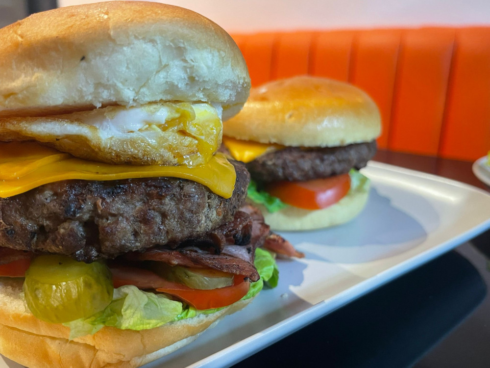Marlons fully loaded burger 8 oz  plus 6oz cheeseburger